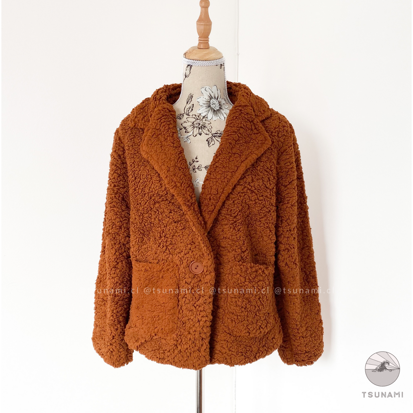 Blazer teddy con botón