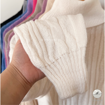 Sueter tejido trenzado con cuello alto
