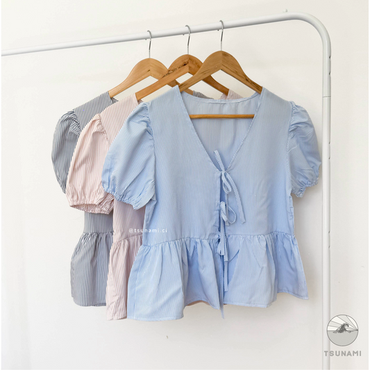 Blusa con líneas y amarritas