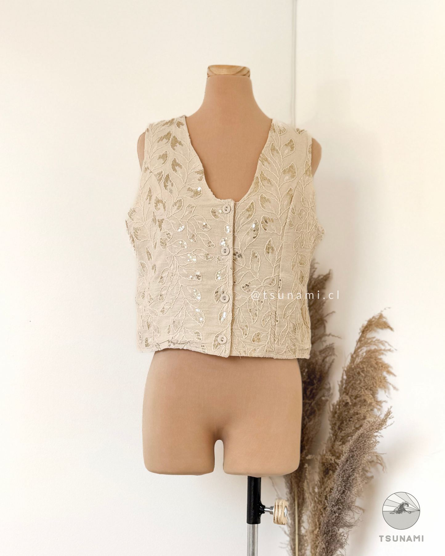 Vest con bordado y lentejuelas