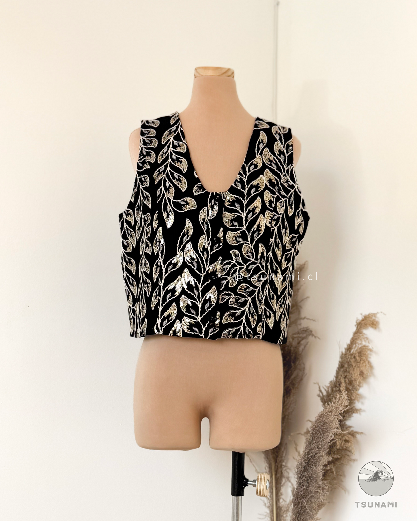 Vest con bordado y lentejuelas